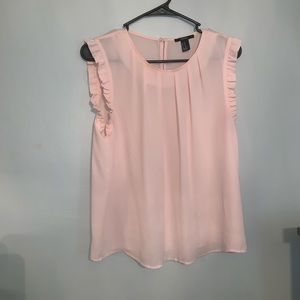 Light pink sleeveless blouse